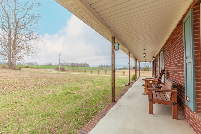 view of yard with a rural view