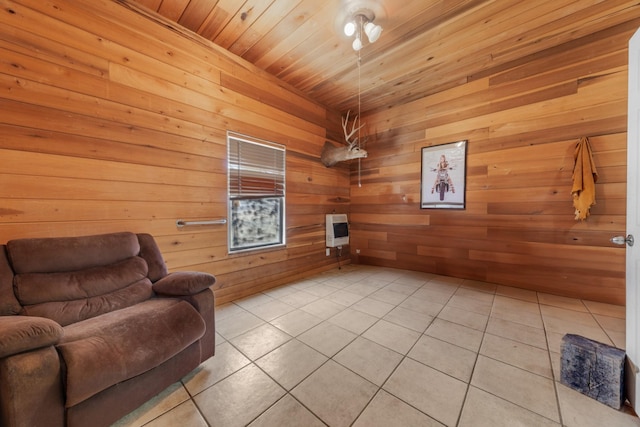 sitting room featuring wood ceiling and light tile patterned floors