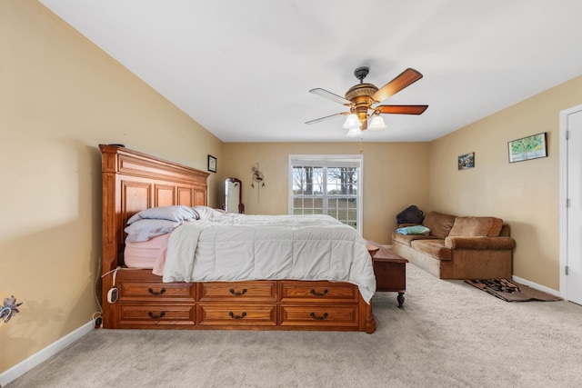 bedroom featuring ceiling fan and light colored carpet