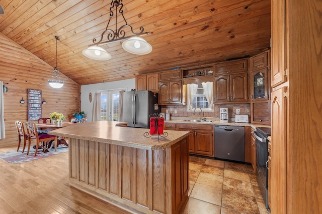 kitchen with a kitchen island, appliances with stainless steel finishes, sink, hanging light fixtures, and wood ceiling