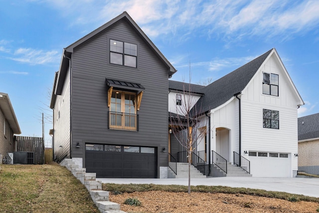 modern farmhouse featuring a garage and central AC unit