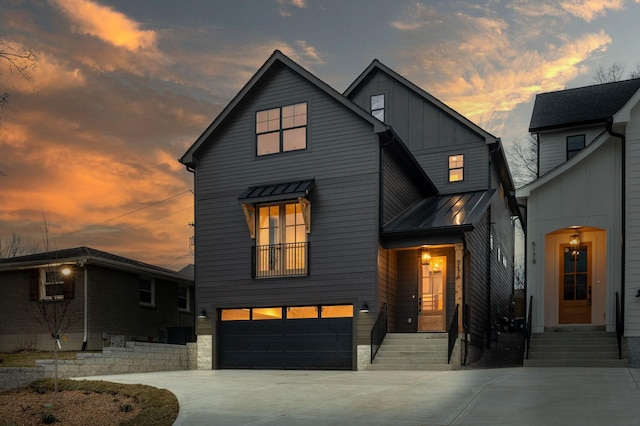 modern farmhouse style home featuring a garage