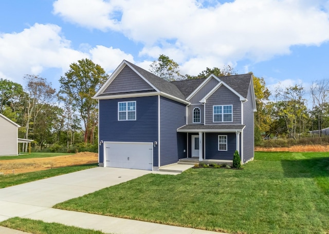 view of front facade featuring a garage and a front lawn