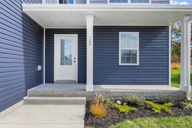 doorway to property with a porch