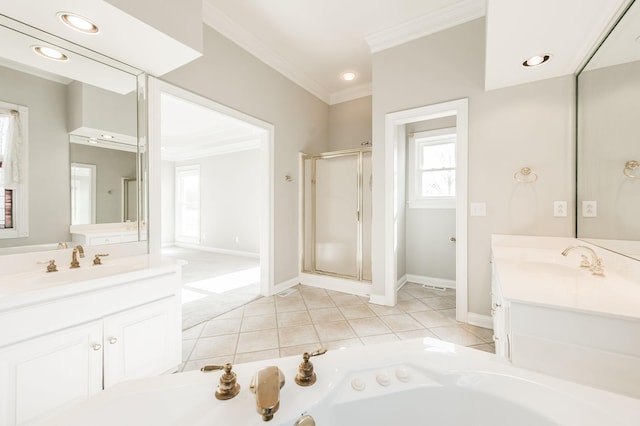 bathroom with vanity, tile patterned floors, ornamental molding, and independent shower and bath