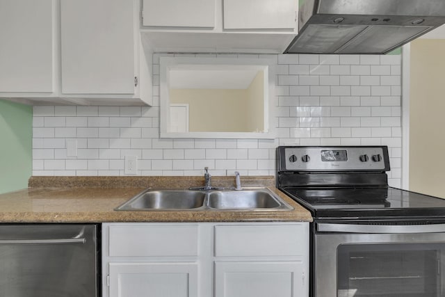 kitchen featuring appliances with stainless steel finishes, white cabinetry, a sink, and under cabinet range hood