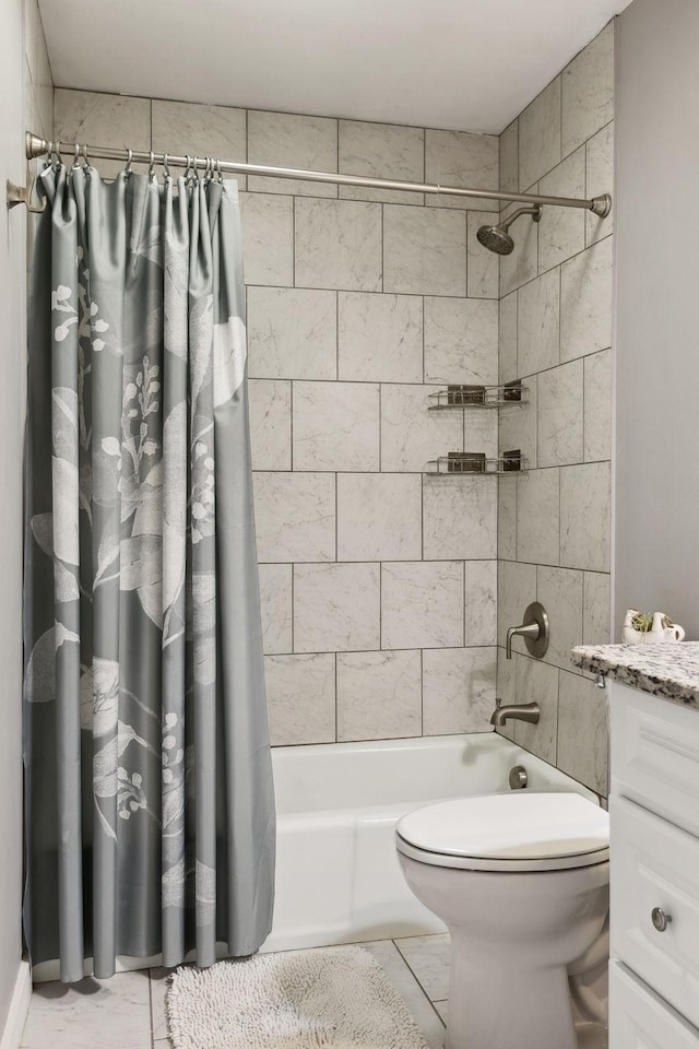 full bathroom with shower / bath combination with curtain, vanity, and toilet