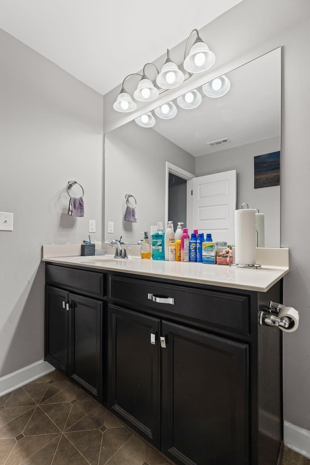 bathroom featuring vanity and tile patterned flooring