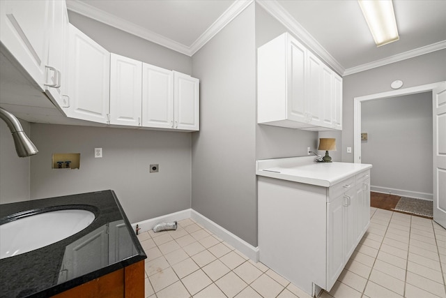 laundry area with light tile patterned floors, sink, electric dryer hookup, washer hookup, and ornamental molding