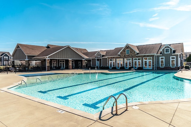 view of swimming pool with a patio area