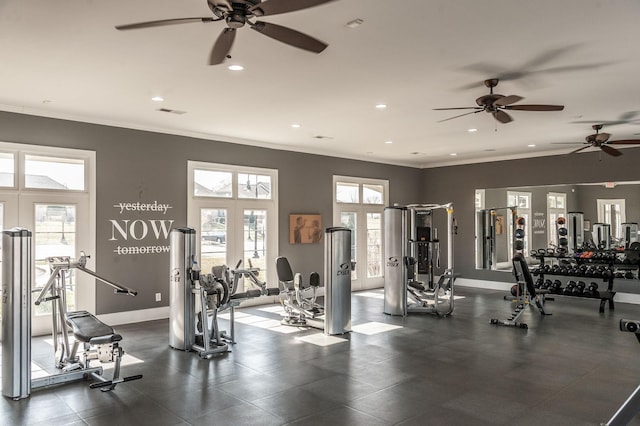 gym with ornamental molding