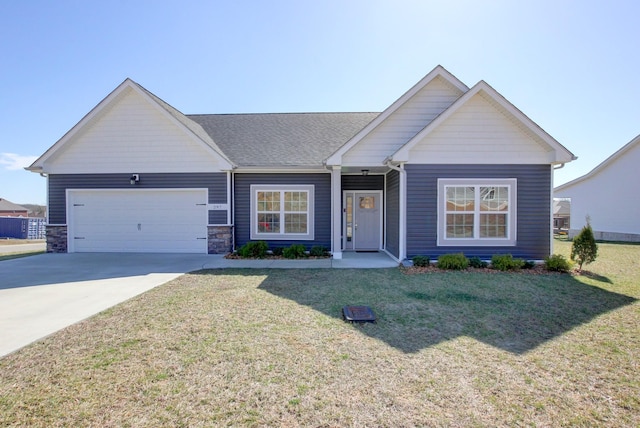 view of front of home with an attached garage, driveway, stone siding, roof with shingles, and a front lawn