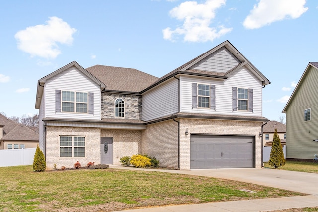 traditional home with a garage, driveway, stone siding, fence, and a front lawn