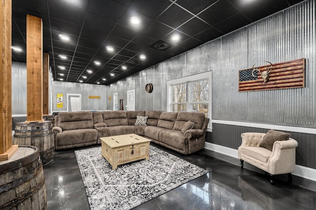 living room with ornate columns