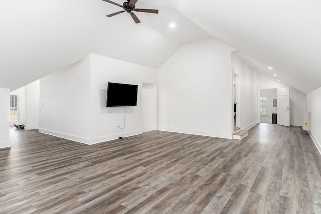 unfurnished living room featuring wood-type flooring, vaulted ceiling, and ceiling fan