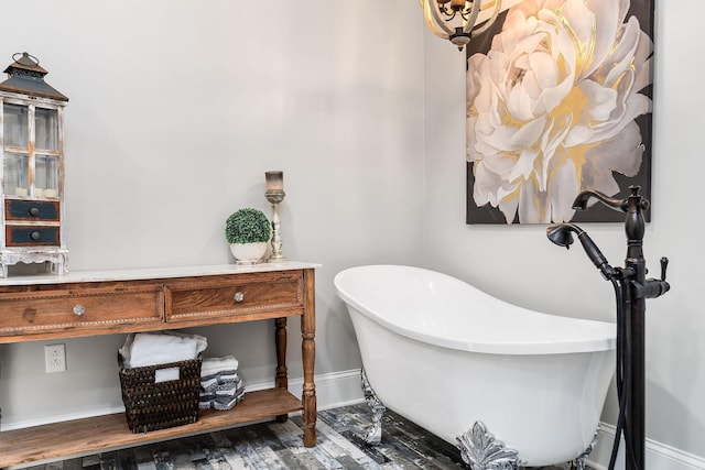 bathroom featuring wood-type flooring and a bathing tub