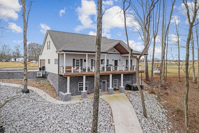 back of house with a wooden deck