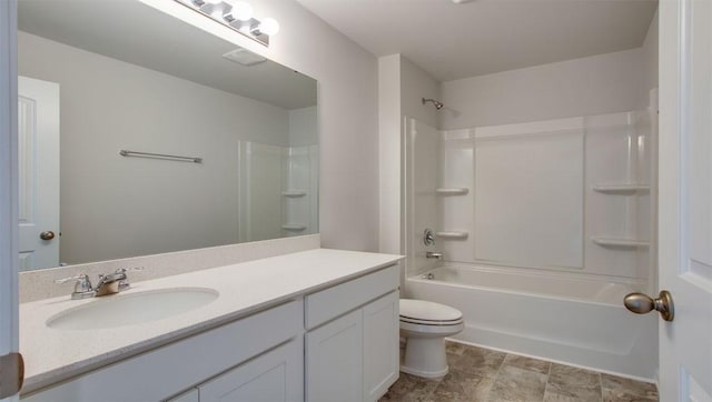 full bathroom with vanity, shower / bathtub combination, and toilet