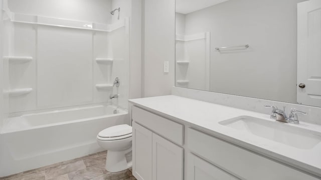 full bathroom with vanity,  shower combination, and toilet