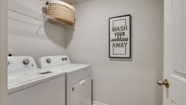 laundry area featuring independent washer and dryer