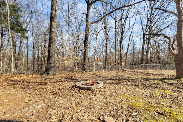 view of yard featuring a fire pit