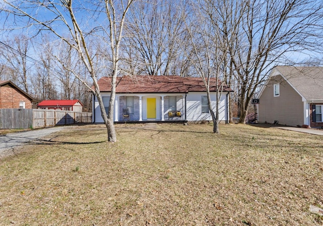 back of house featuring a yard