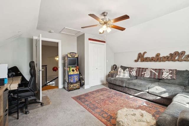 living room featuring lofted ceiling and carpet flooring