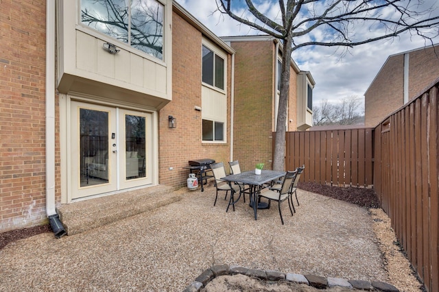 view of patio / terrace with french doors and a grill