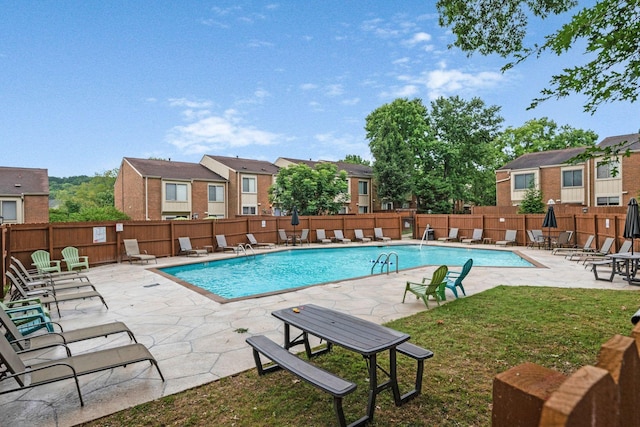 view of pool featuring a patio area