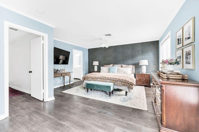 bedroom featuring dark hardwood / wood-style flooring and ornamental molding