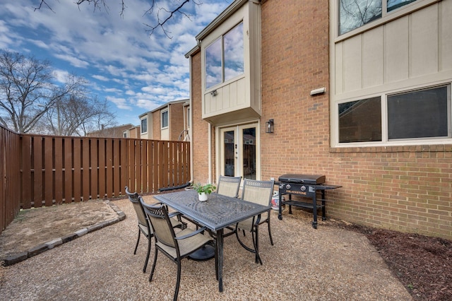 view of patio / terrace featuring french doors and a grill