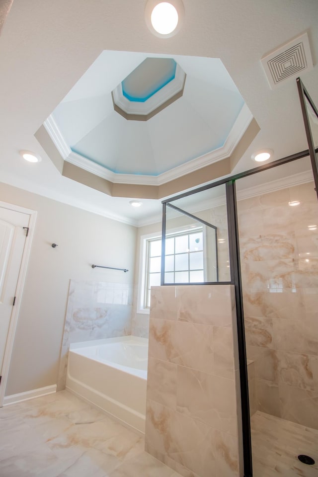 bathroom featuring crown molding and shower with separate bathtub