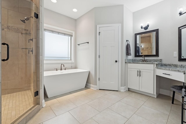 bathroom with vanity, separate shower and tub, and tile patterned floors