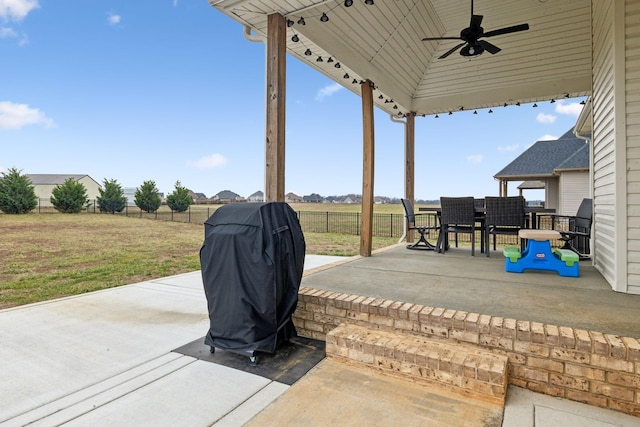 view of patio featuring ceiling fan and area for grilling