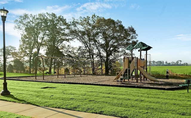 view of jungle gym with a yard