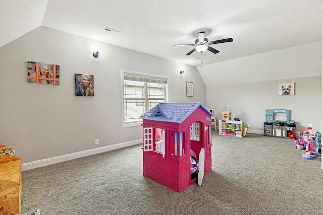 recreation room with carpet floors, vaulted ceiling, and ceiling fan