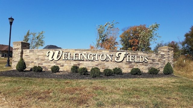 community sign with a yard