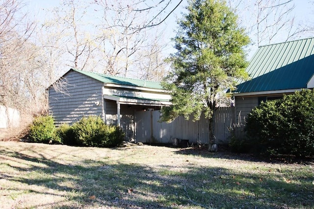 view of home's exterior with a yard