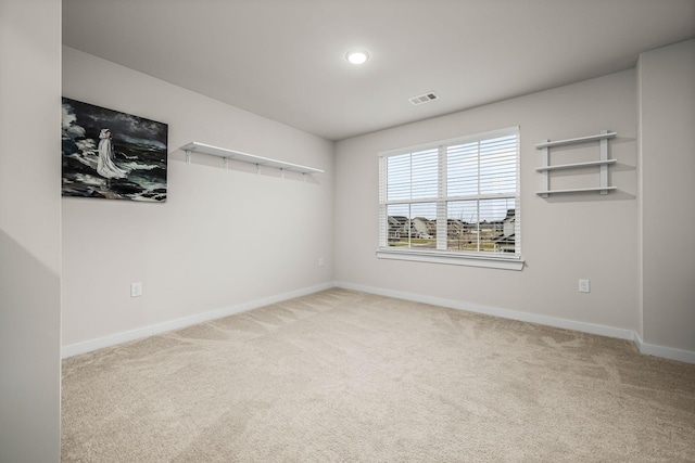 view of carpeted spare room