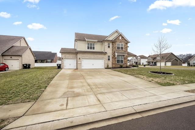 view of front property featuring a garage and a front yard