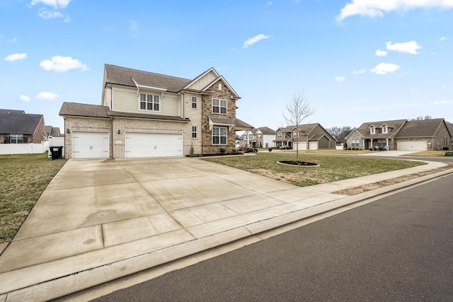 view of front property with a garage and a front lawn