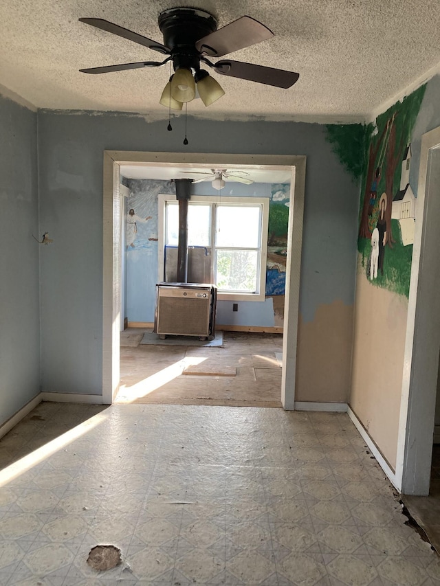 interior space with a textured ceiling