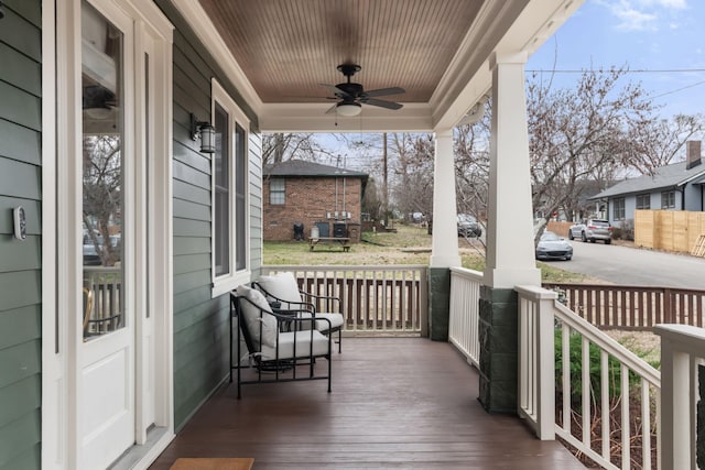 deck featuring ceiling fan and covered porch