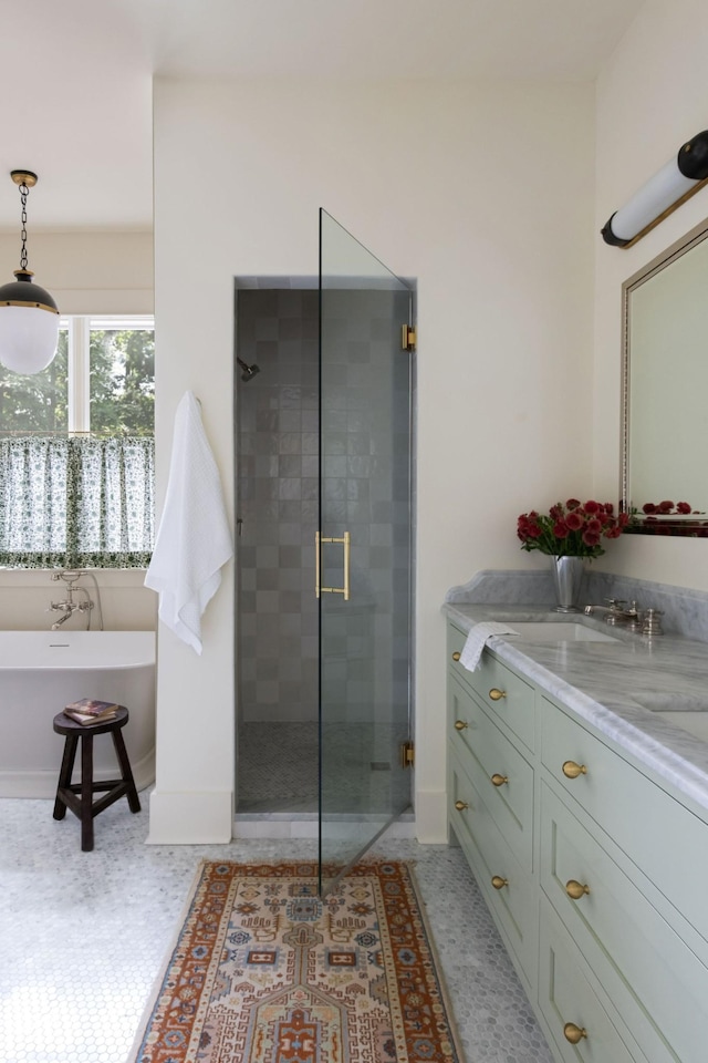 bathroom featuring tile patterned flooring, vanity, and independent shower and bath