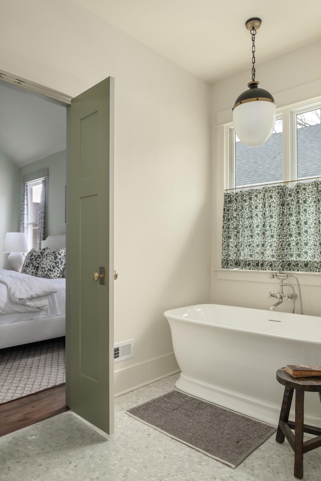 bathroom with a bathing tub