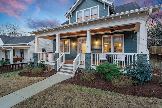 craftsman inspired home featuring ceiling fan and covered porch