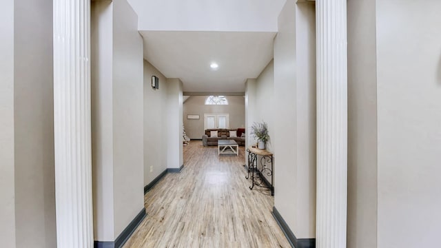 hallway with light wood-type flooring