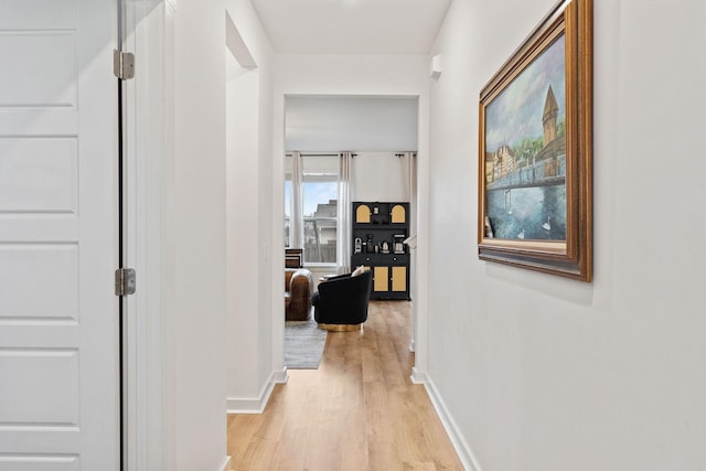 hallway featuring light wood-type flooring