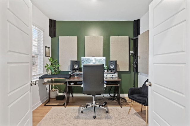 office area with light hardwood / wood-style flooring