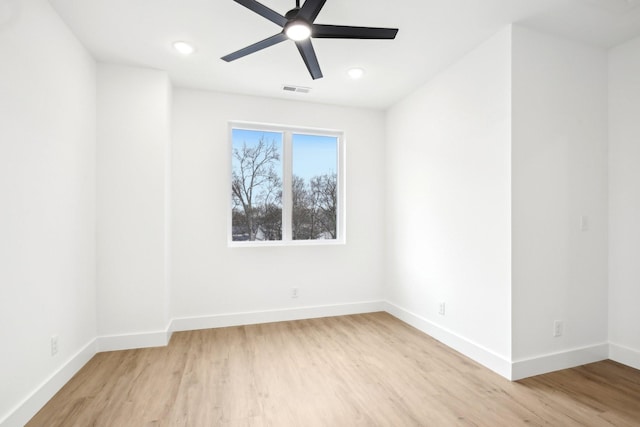 unfurnished room featuring ceiling fan and light hardwood / wood-style flooring